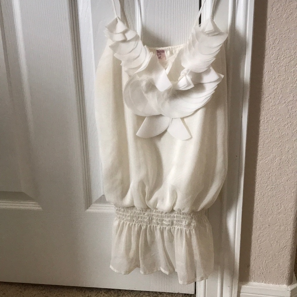 White floral top size small with curved hem